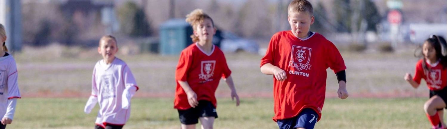 A child playing soccer